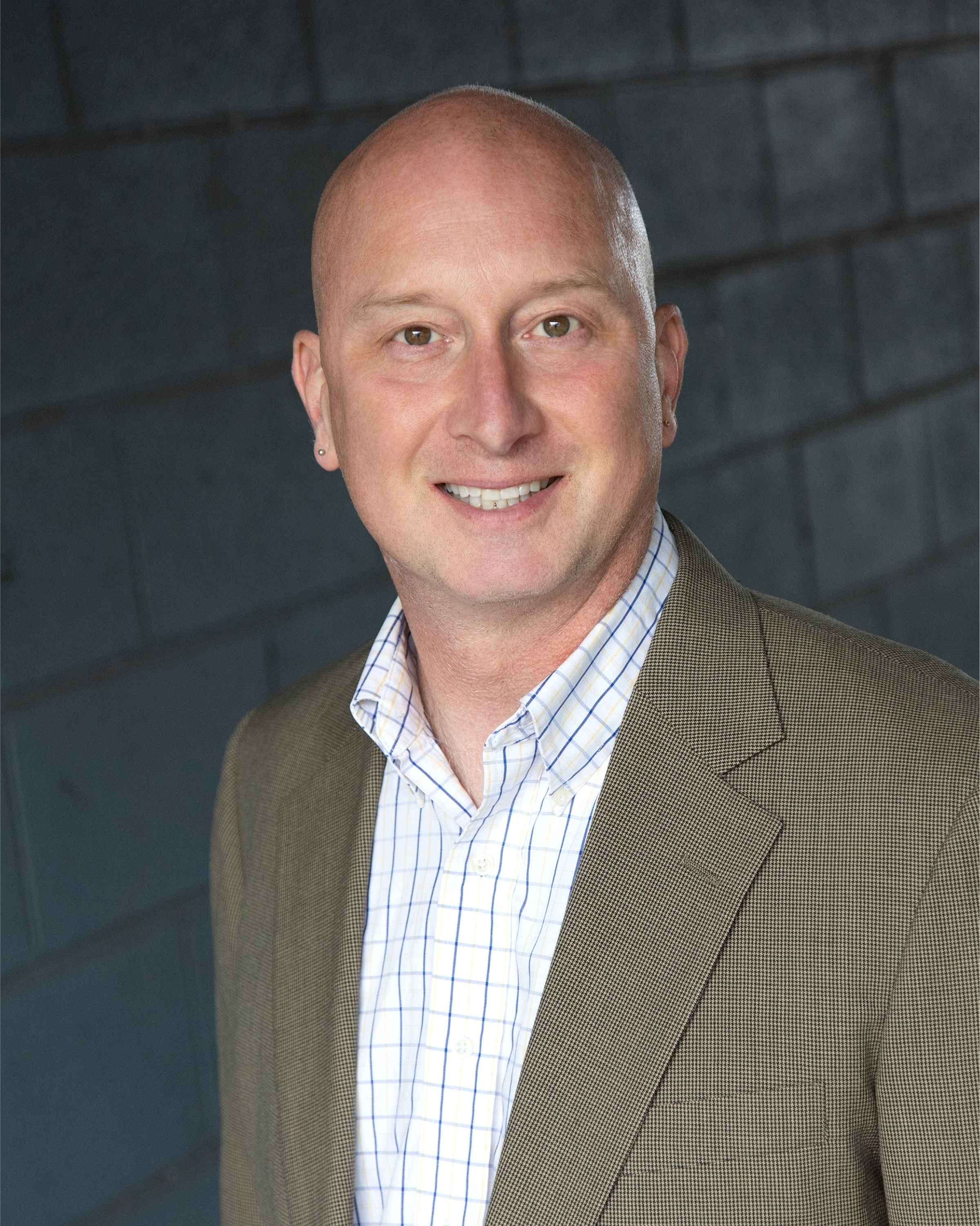Dr. Adam M. Pine